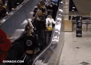 girl-going-up-the-escalator-fail